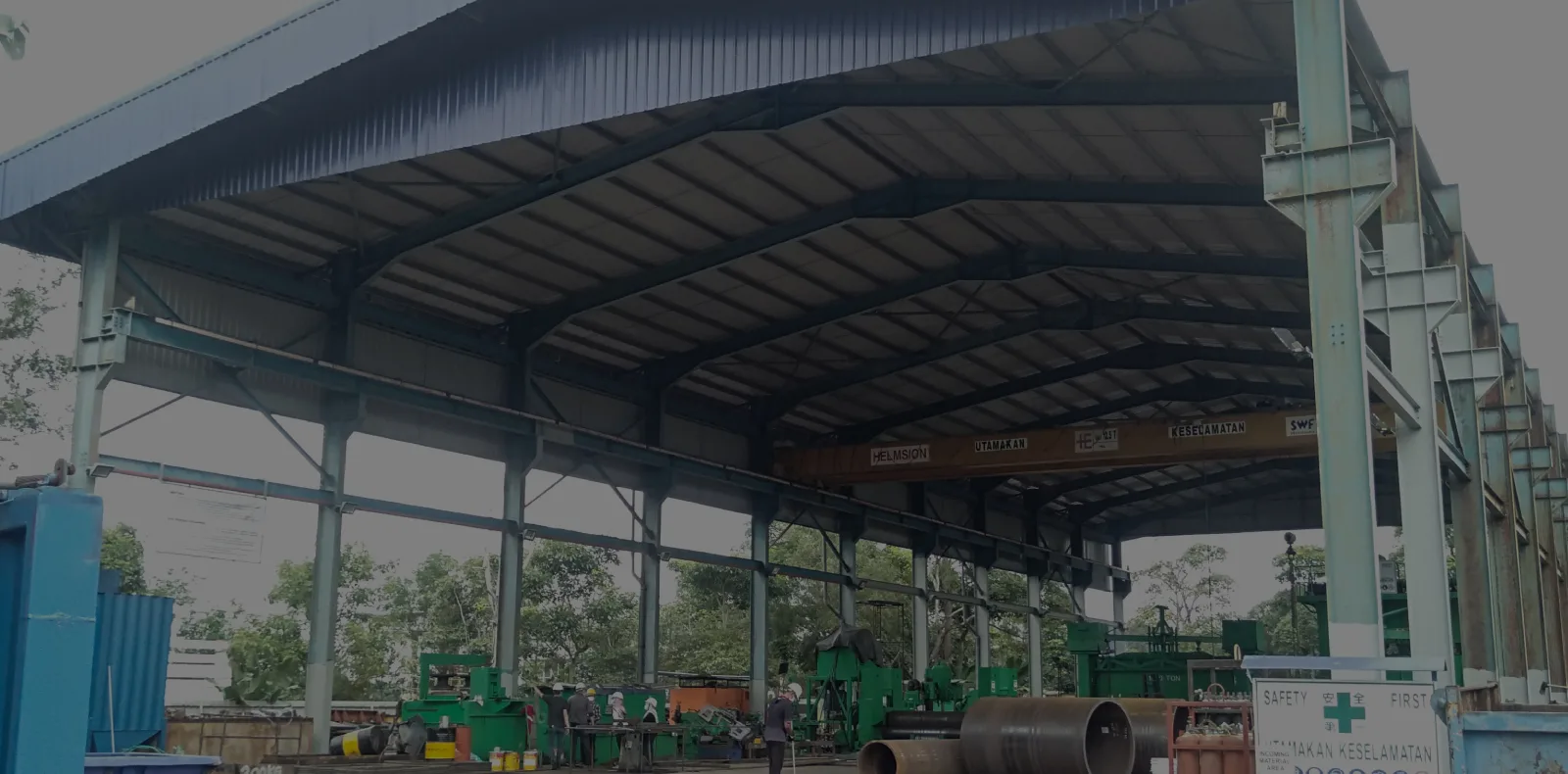 Large steel structure warehouse with overhead crane and fabrication machines, fabrikasi besi Klang